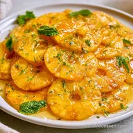 Carpaccio de Piña Y Menta con Miel de Acacia